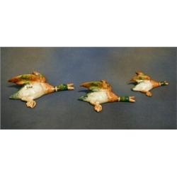 A set of 3 Beswick flying ducks, the backs impressed Beswick England 596-2, £50-75...