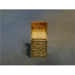An Edwardian embossed silver card case with hinged lid and contents of cards Birmingham 1909 £200...