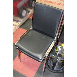 PAIR OF BLACK AND CHROME STACKING CHAIRS