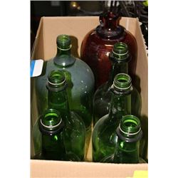 BOX OF GREEN GLASS BOTTLES