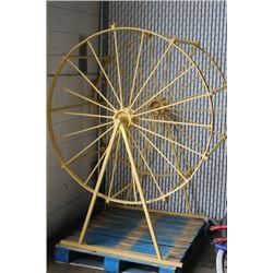 LARGE YELLOW METAL WHEEL PLANTER