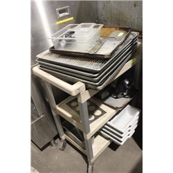 BUSSING CART TIH OVEN TRAYS, CUTLERY TRAYS ETC.