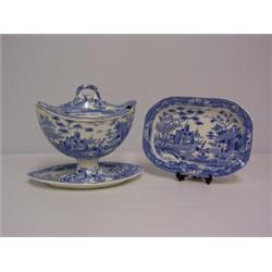 BLUE AND WHITE UNUSUAL SHAPED SAUCE BOAT ON STAND,together with small plate in the Gothic Castle...