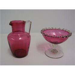 CRANBERRY SUGAR BOWL,with clear frilled edge and stem foot 40 - 50...