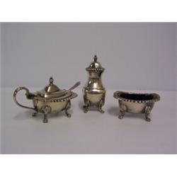 SILVER PLATED CRUET,comprising a pepper pot,glass lined salt,glass lined mustard pot with lid and...