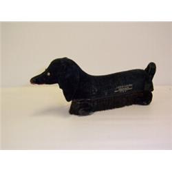 UNUSUAL COLTHES BRUSH,made into a velvet dachound dog with glass eyes. Ye Ole Curiosity Shoppe pr...