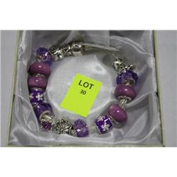 SILVER CHARMS PURPLE STONES BRACELET