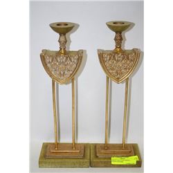 PAIR OF GOLD TONE DESIGNER CANDLE HOLDERS