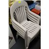 Image 1 : STACK OF 4 OUTDOOR CHAIRS