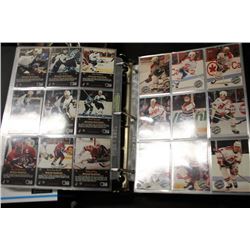 BINDER OF ASSORTED 90-91 HOCKEY CARDS