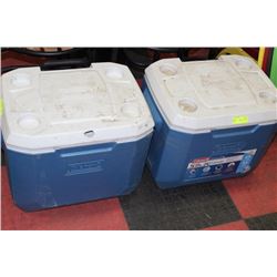2 COLEMAN CAMP COOLERS ON WHEELS ONE W/ DAMAGE