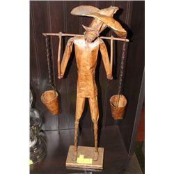 LARGE PAPER MAN WITH WATER JUGS