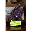 Image 1 : LARGE PURPLE QUARTZ CRYSTAL STONE ON STAND