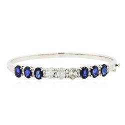 14KT White Gold 5.76 ctw Sapphire and Diamond Bracelet