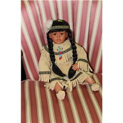 NATIVE PORCELAIN DOLL