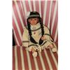 Image 1 : NATIVE PORCELAIN DOLL