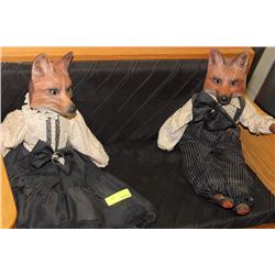PAIR OF CERAMIC FOX ORNAMENTS