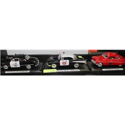 SET OF 3 DIE CAST POLICE CARS W STANDS