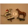 Image 1 : Two car mascots, one silver plated horse with jockey in riding colours, the other of chestnut hor…