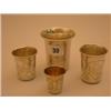 Image 1 : Graduated set of four Russian silver marked measures with etched decoration…