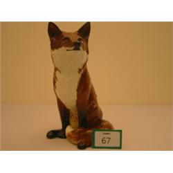 Beswick seated fox, 12.5" high, repair to one leg…