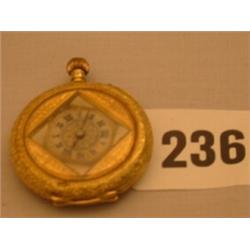 18ct gold ladies pocket watch, heavily embossed, with enamelled birds and flowers on back…