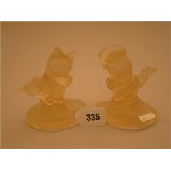 Two pink pressed glass figures of Donald and Daisy Duck, circa 1950…