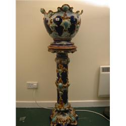 Superb Majolica jardiniere and stand by Thomas Booth & Son with embossed decoration on blue groun…