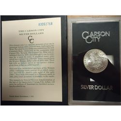 1883 -CC GSA MORGAN SILVER DOLLAR (UNC) WITH ORIGINAL US MINT PACKAGING AND CERTIFICATE.