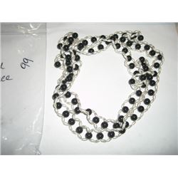 Long beaded pearl white and black necklace