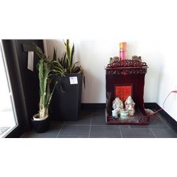 TWO FLOWER POTS WITH PLANTS AND WOODEN SHRINE WITH ORNAMENTS