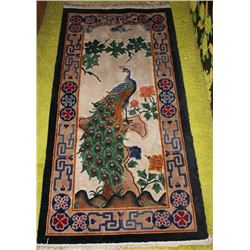 APRROXIMATELY 2' X 5 ' WOVEN SILK PEACOCK CARPET