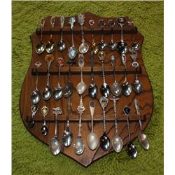 SOUVENIR SPOONS ON WOODEN SHIELD  DISPLAY