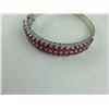 Image 2 : STERLING SILVER GLASS FILLED RUBY SET BANGLE STYLE BRACELET WITH 42 GLASS FILLED RUBIES, APPROX