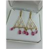 Image 2 : PAIR OF 14KT YELLOW GOLD DANGLING RUBY BRIOLETTE EARRINGS WITH A TOTAL OF 6 RUBY BRIOLETTES