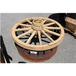 VINTAGE WOODEN WAGON WHEEL AND A METAL HORSESHOE FIREPIT RING