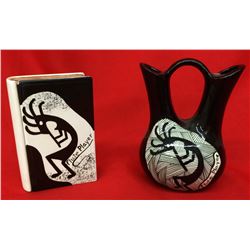 Group of 2 “Flute Player” pots.