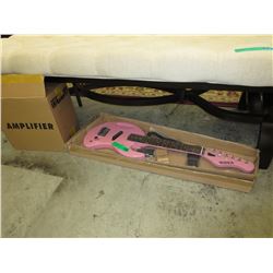 New child size pink electric guitar & amplifier