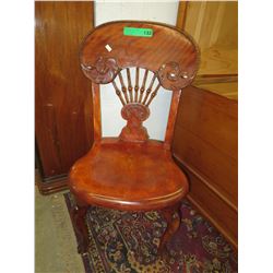 Antique children's wood chair with high back
