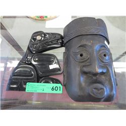 First Nations raven carving with abalone eye