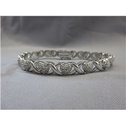 Diamond studded heart & X design bracelet