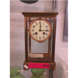 Vintage mantle clock with enameled face