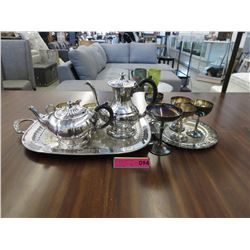 11 Pieces of silver plated serving ware