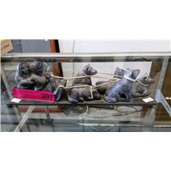 Carving of an Eskimo dog sled