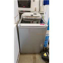 Used Whirlpool clothes washer - top loading