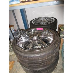 4 All-Season Sport UHT Tires on rims