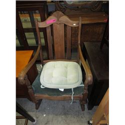 Vintage wood rocking chair with upholstered seat