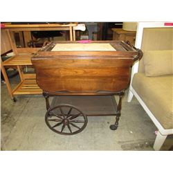 Vintage rolling tea trolley with drop sides
