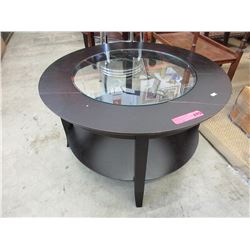 Round coffee table with glass insert top
