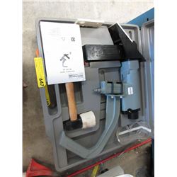 Air powered flooring nailer in protective case
